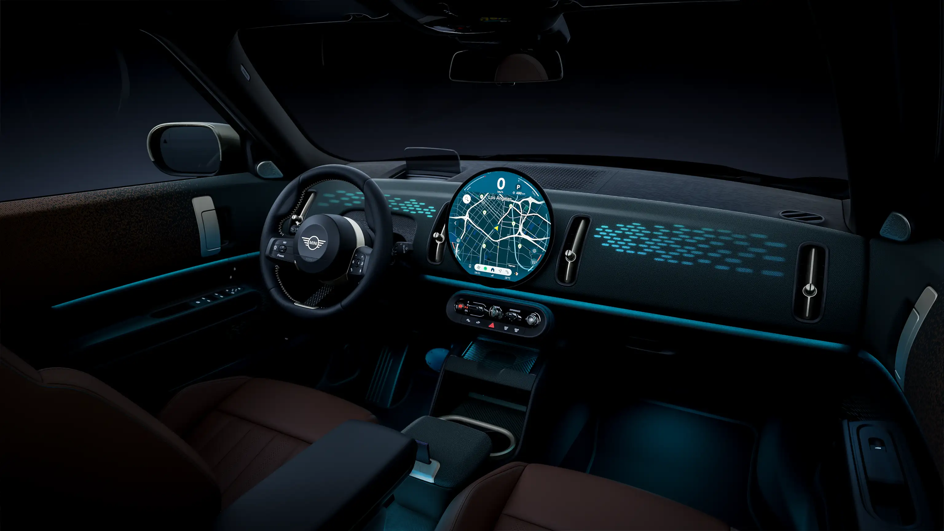 Panoramic view of the illuminated dashboard of the all-electric MINI Countryman